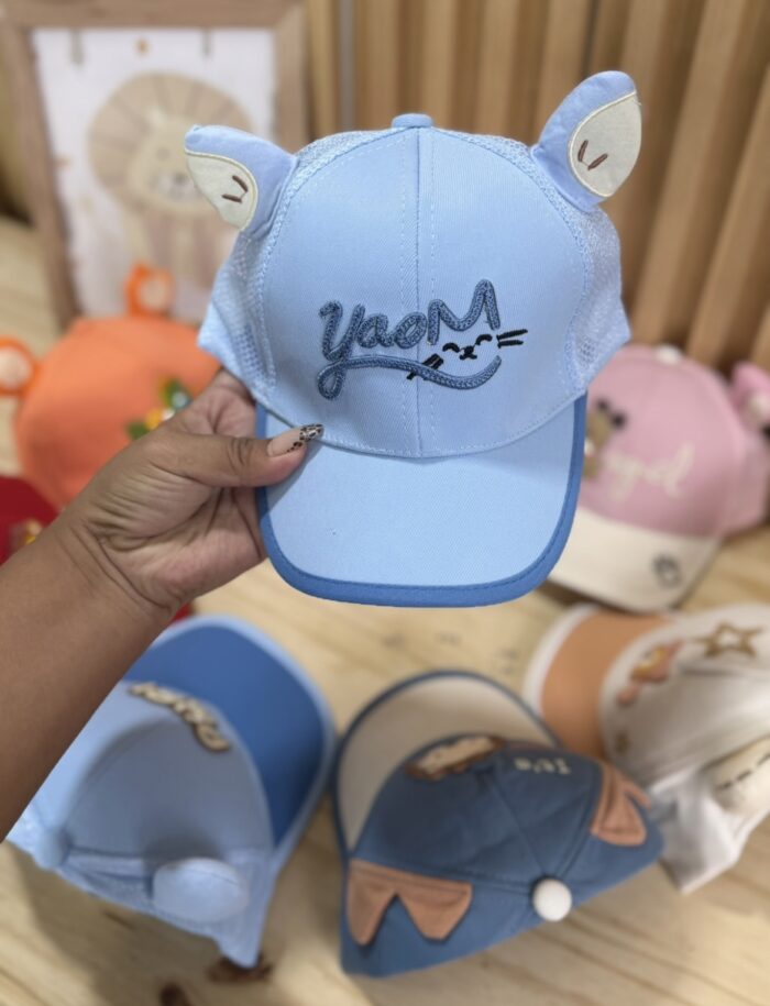MEDIA DOCENA GORRA BEBÉ UNISEX - Imagen 1